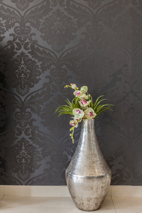 Vertical view of flower in old-fashioned vase